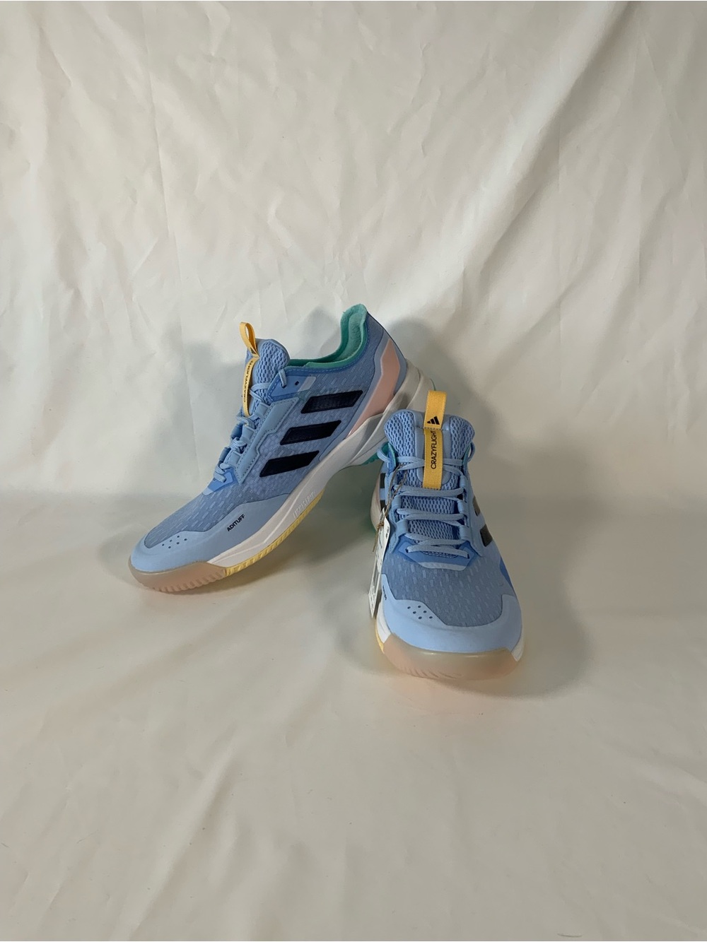 adidas womens Light Blue Sneakers with Yellow Pull Tabs